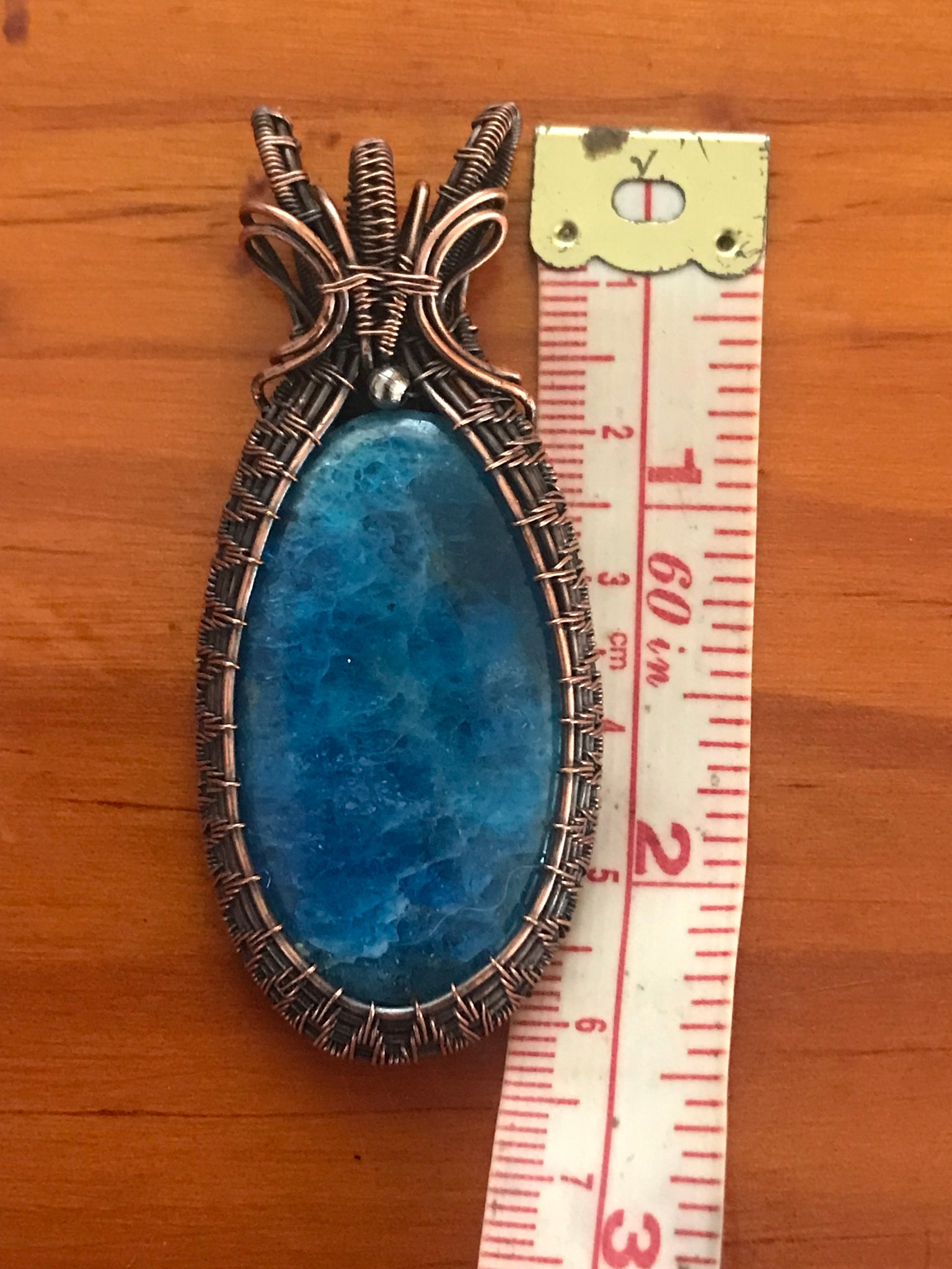 Apatite woven copper wire pendant