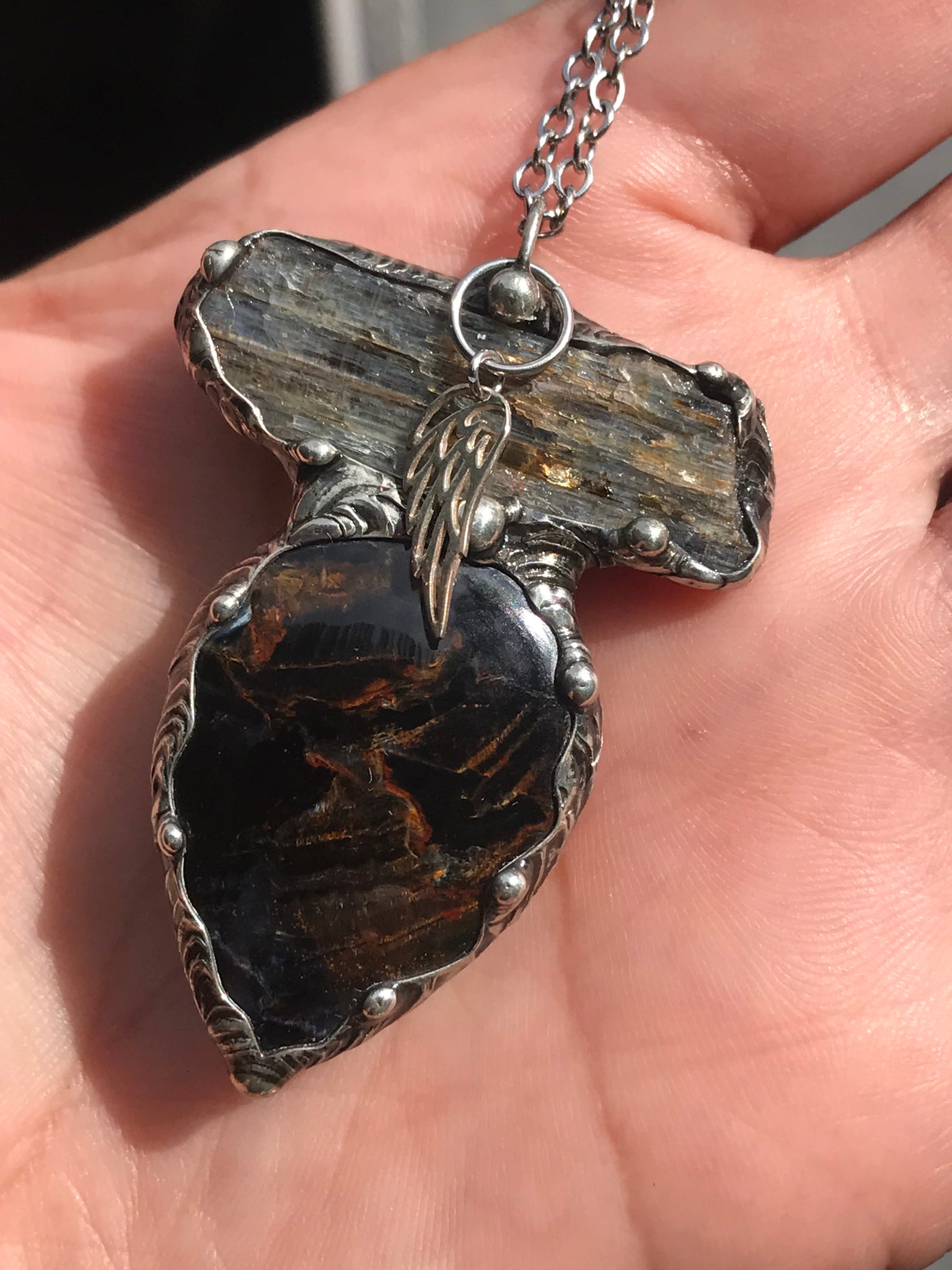 Pietersite and blue Kyanite magic adorned with a sterling silver wing