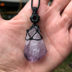 Rough Amethyst Point and black onyx wrapped in Linhasita