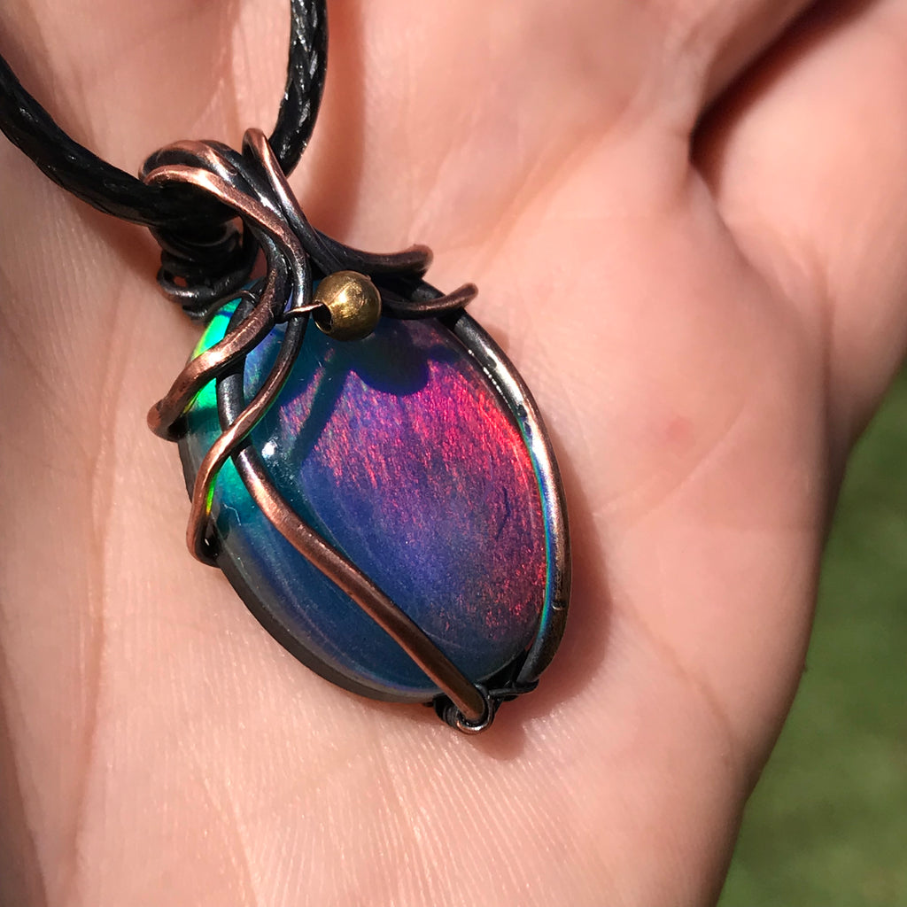 Wire wrapped Aurora Borealis Opal treasure