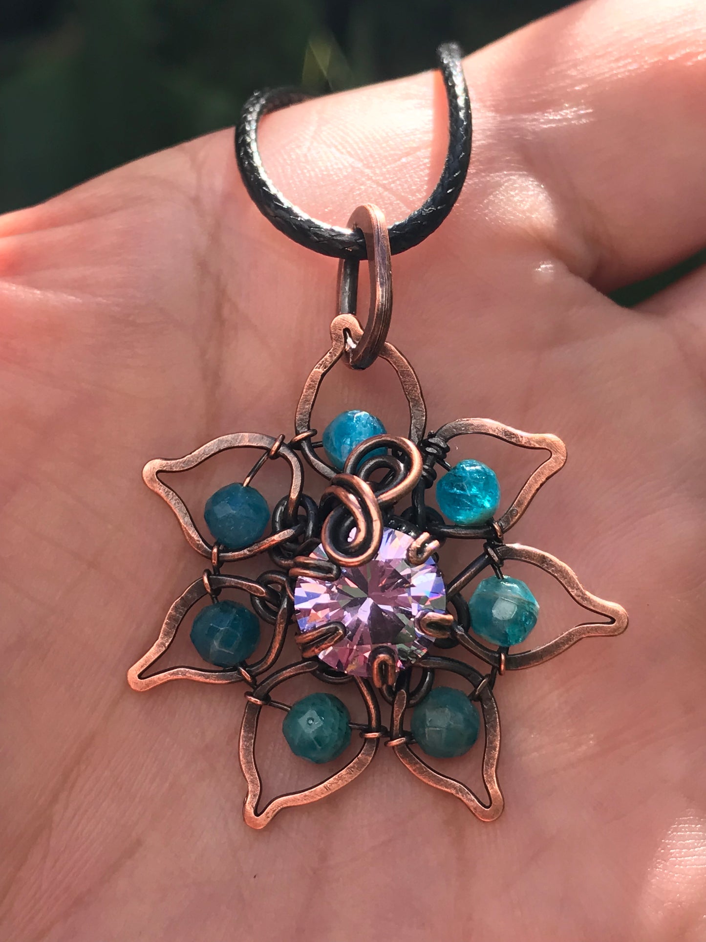 Copper crafted lotus flower pendant with Apatite