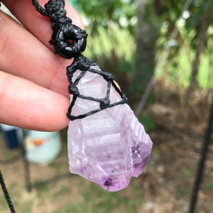 Rough Amethyst Point and black onyx wrapped in Linhasita