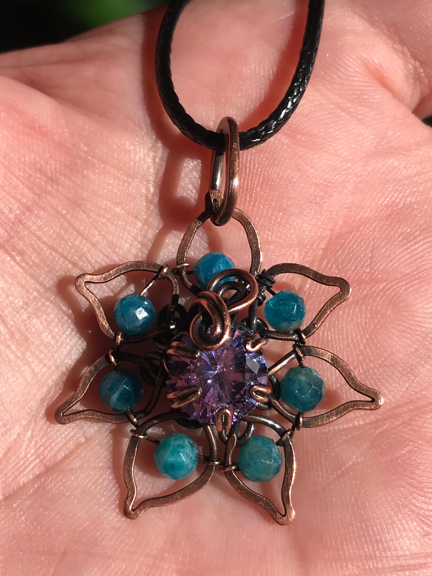 Copper crafted lotus flower pendant with Apatite