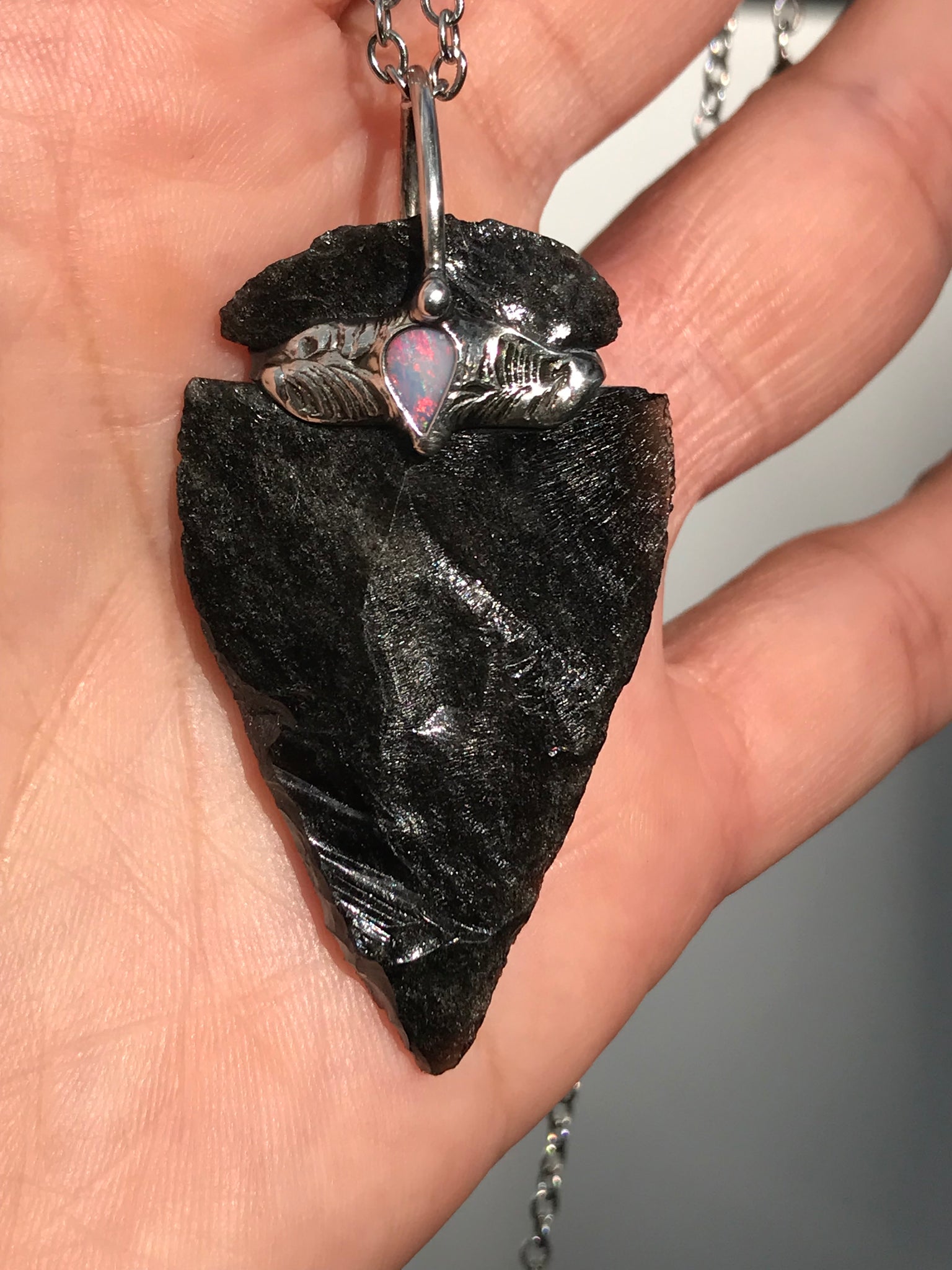 Silversheen Obsidian Arrowhead adorned with lightning ridge Opal