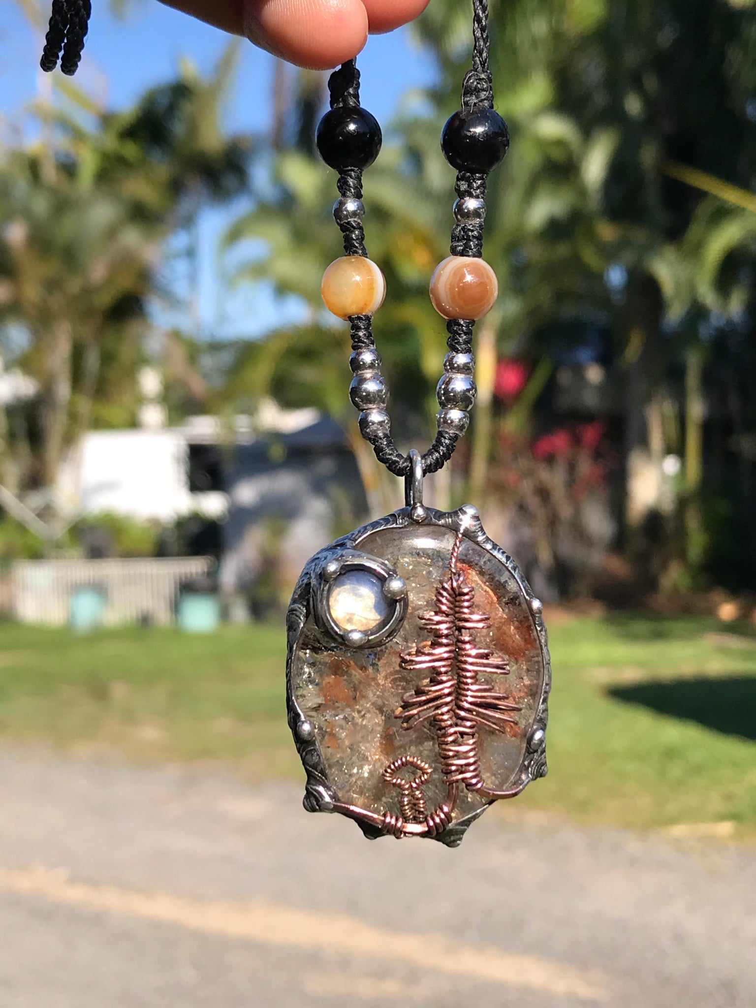 Bespoke tree landscape on hematite Quartz adorned with a mystical opalite moon