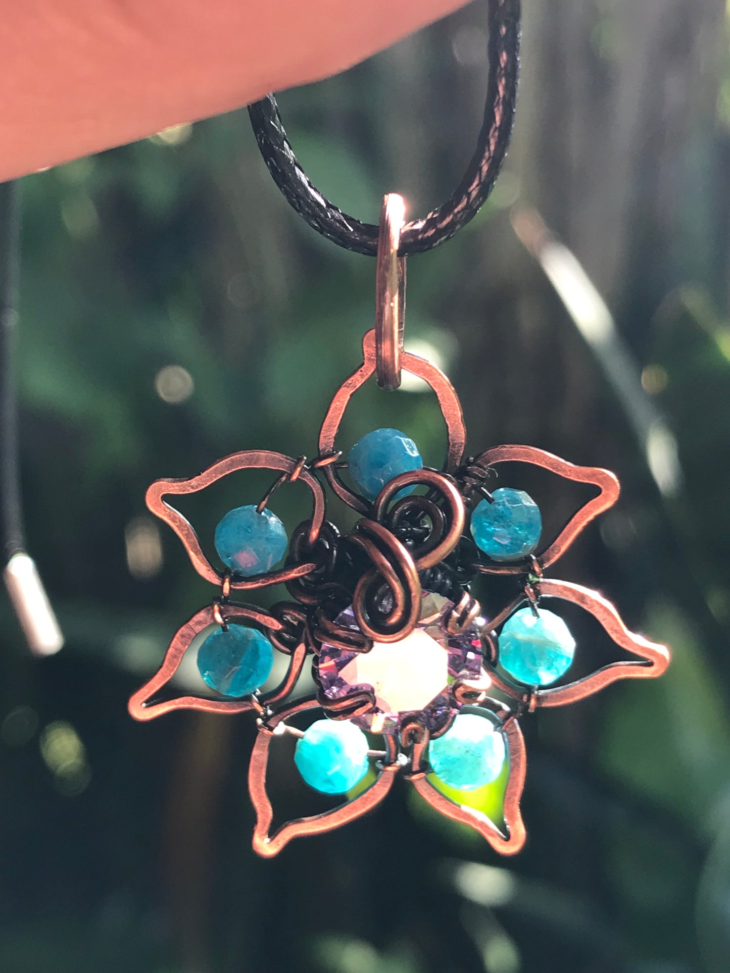 Copper crafted lotus flower pendant with Apatite