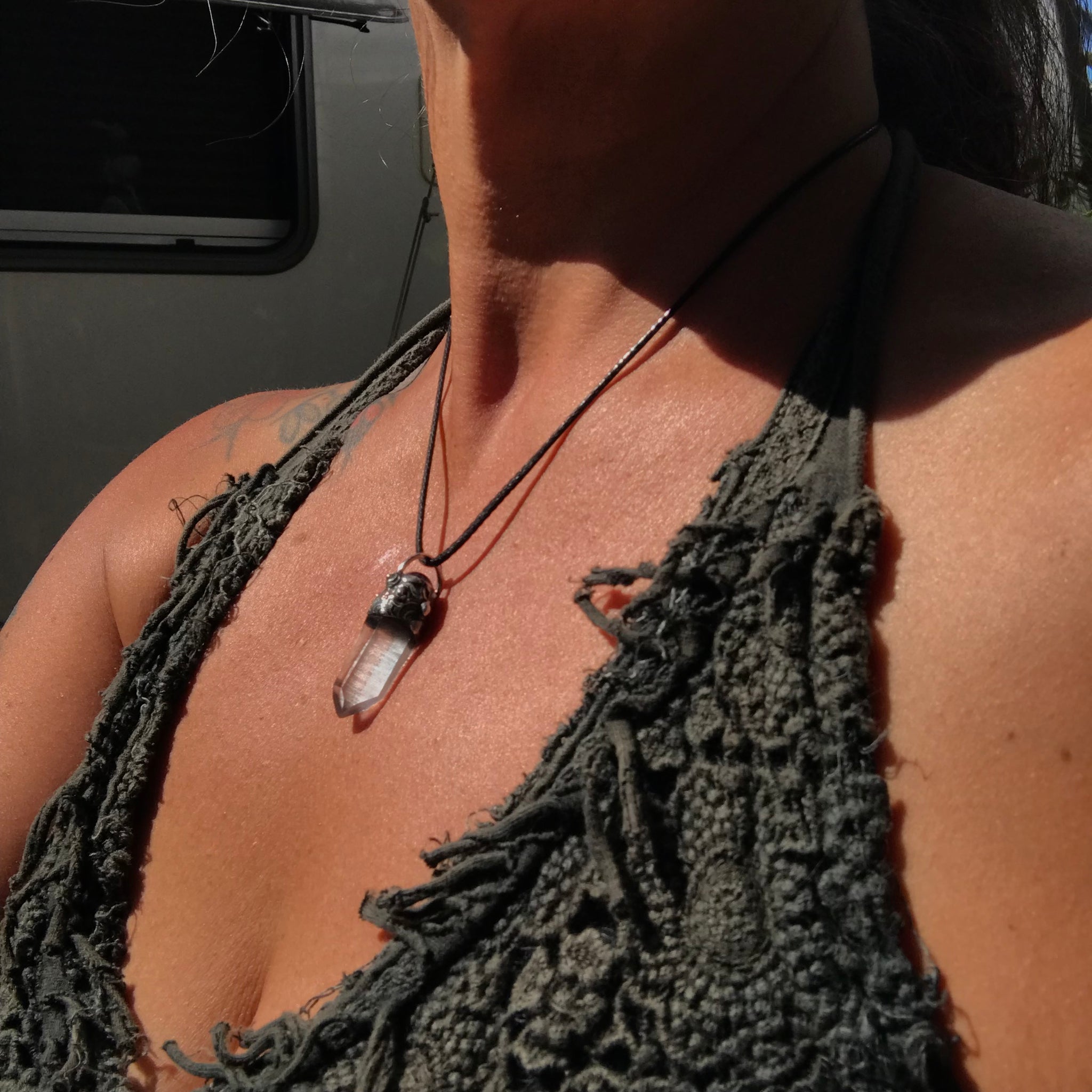 Lemurian seed crystal adorned with Amethyst