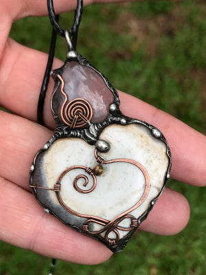 Solar Quartz heart/Rosequartz pendant adorned with a Celtic copper heart and spiral