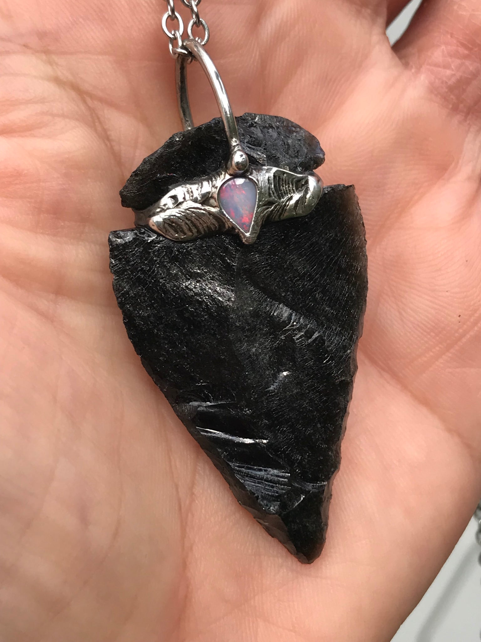 Silversheen Obsidian Arrowhead adorned with lightning ridge Opal