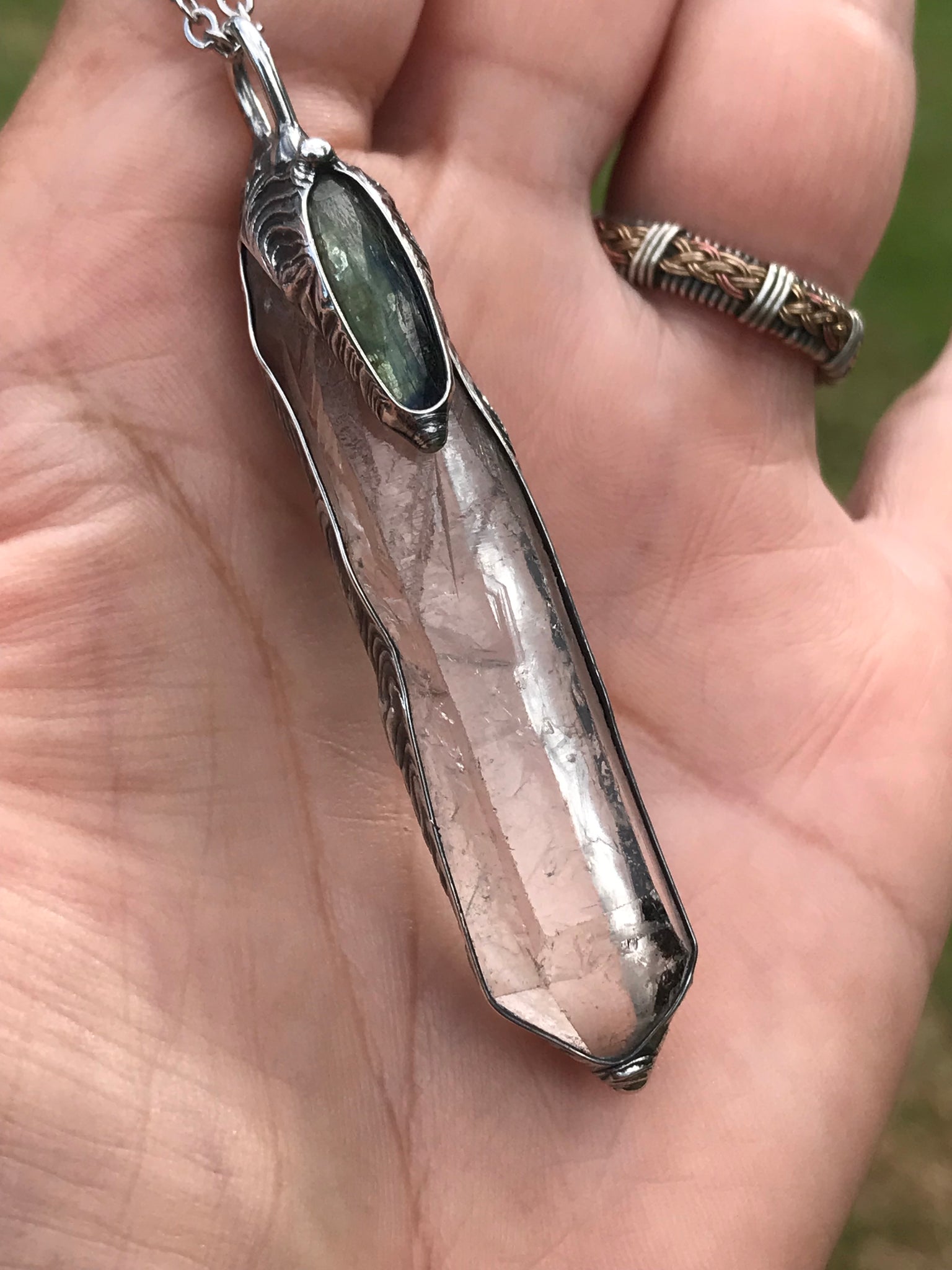 Clear Quartz crystal point with green faceted kyanite