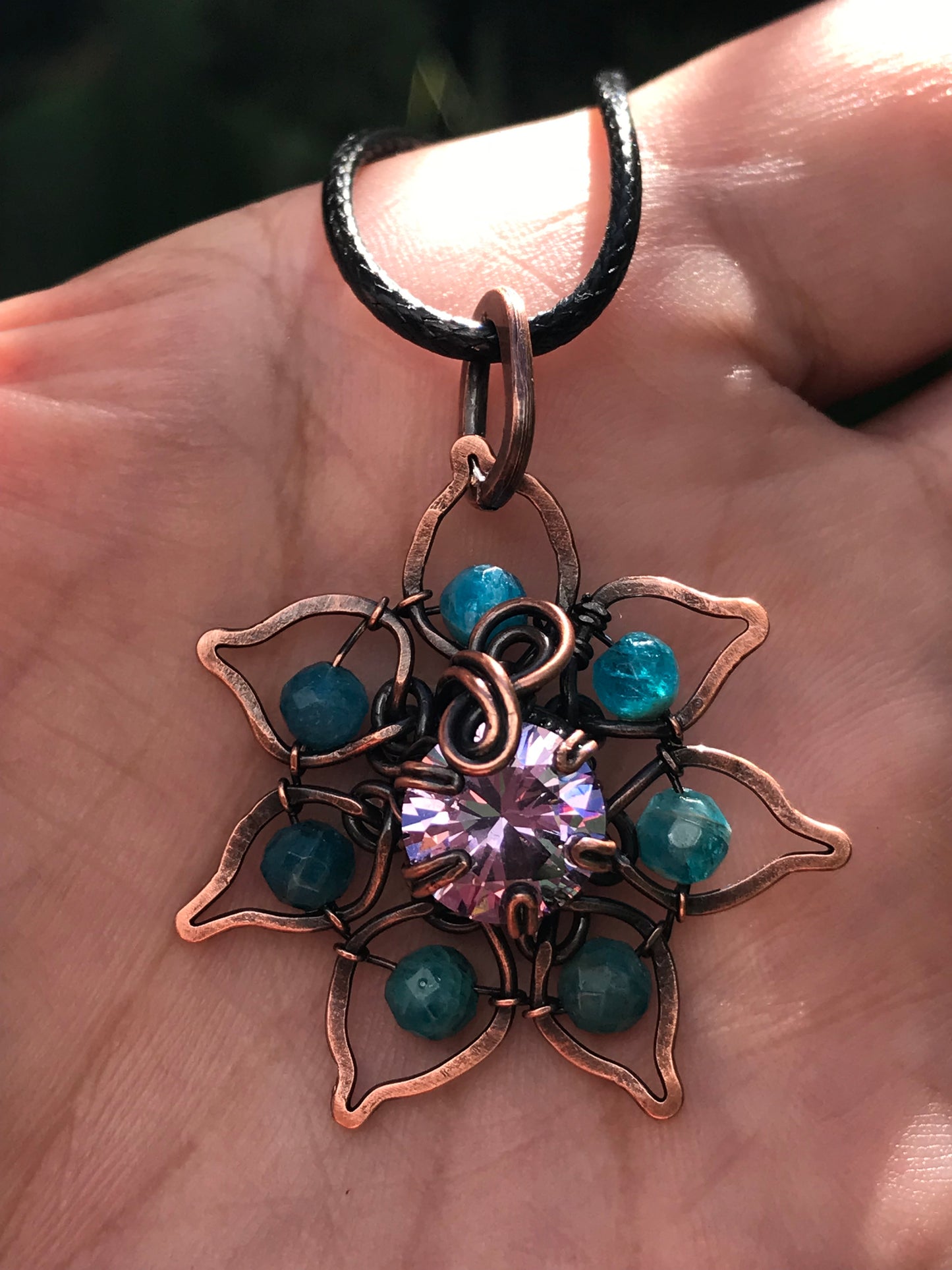 Copper crafted lotus flower pendant with Apatite