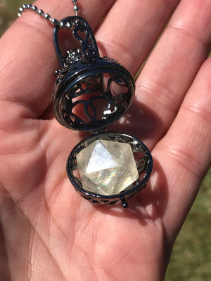 Reserved for Rachele Icosahedron Calcite within metal cage pendant