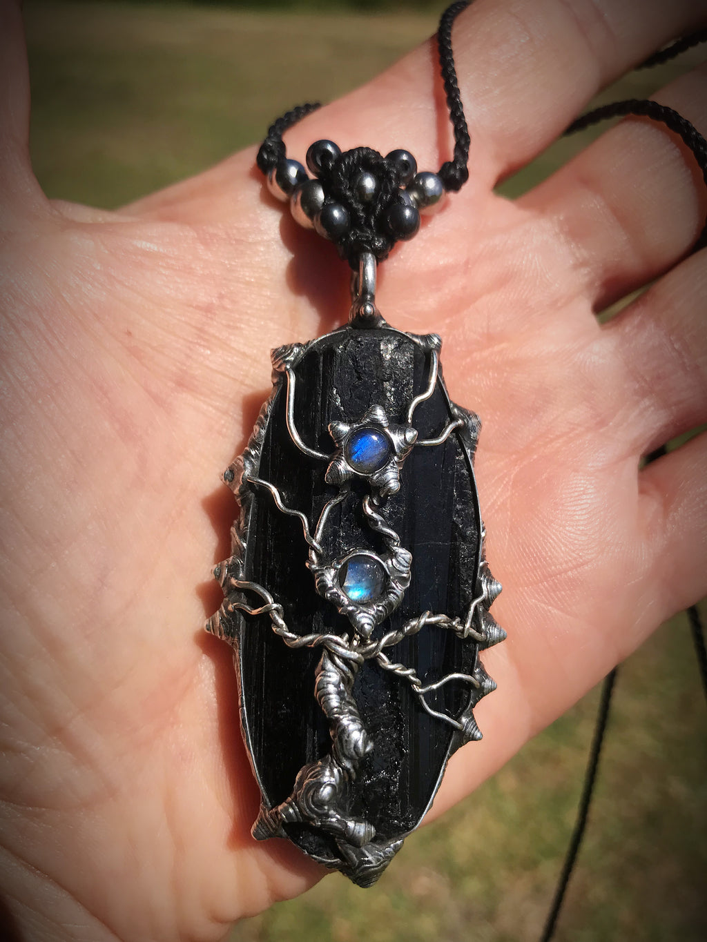 Sterling Silver Tree set on Black Tourmaline adorned with blue flash labradorite