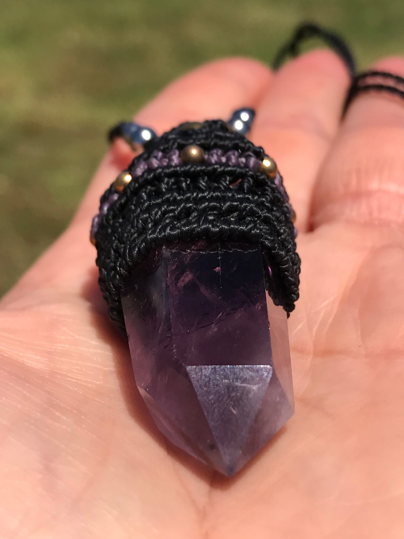 Amethyst Point wrapped in Linhasita