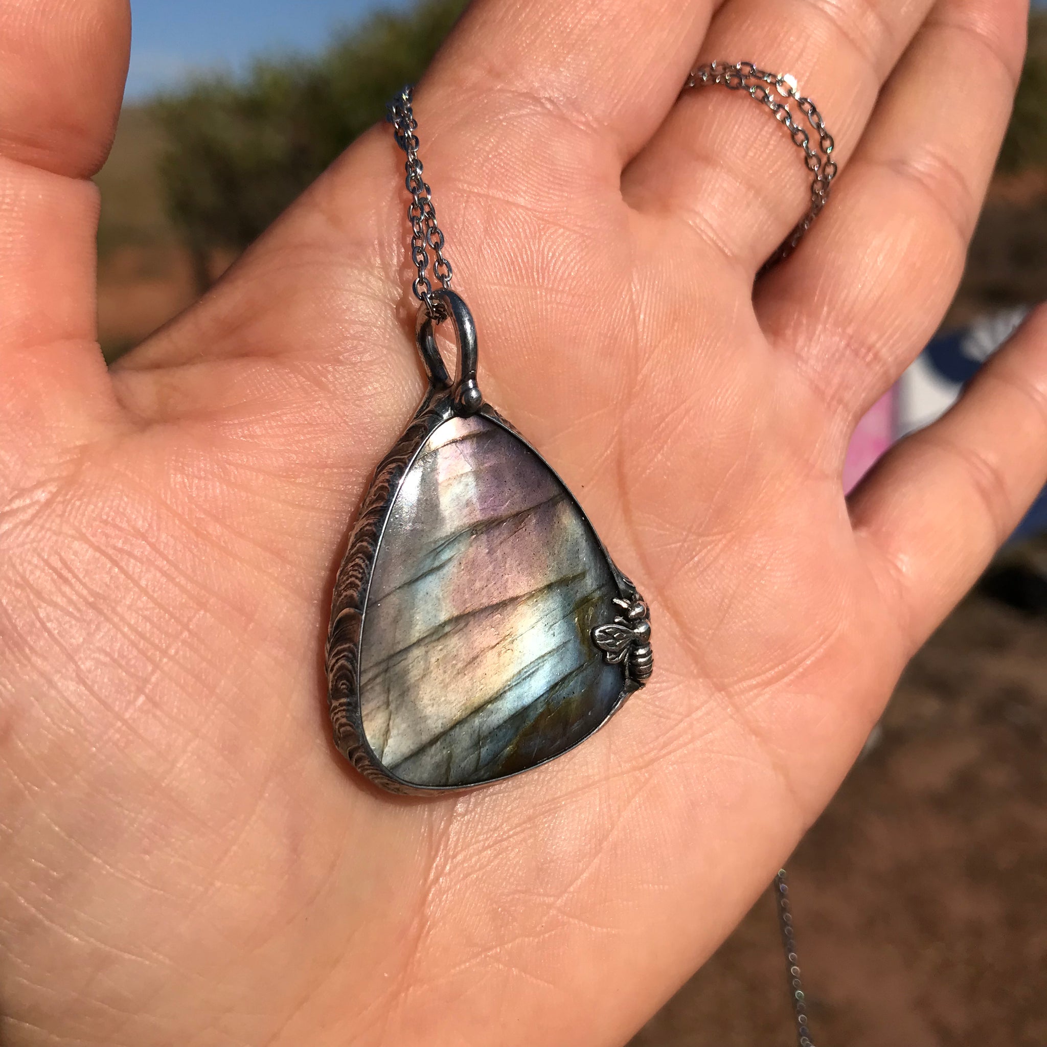 Bee attracted to Purple and blue flash Labradorite